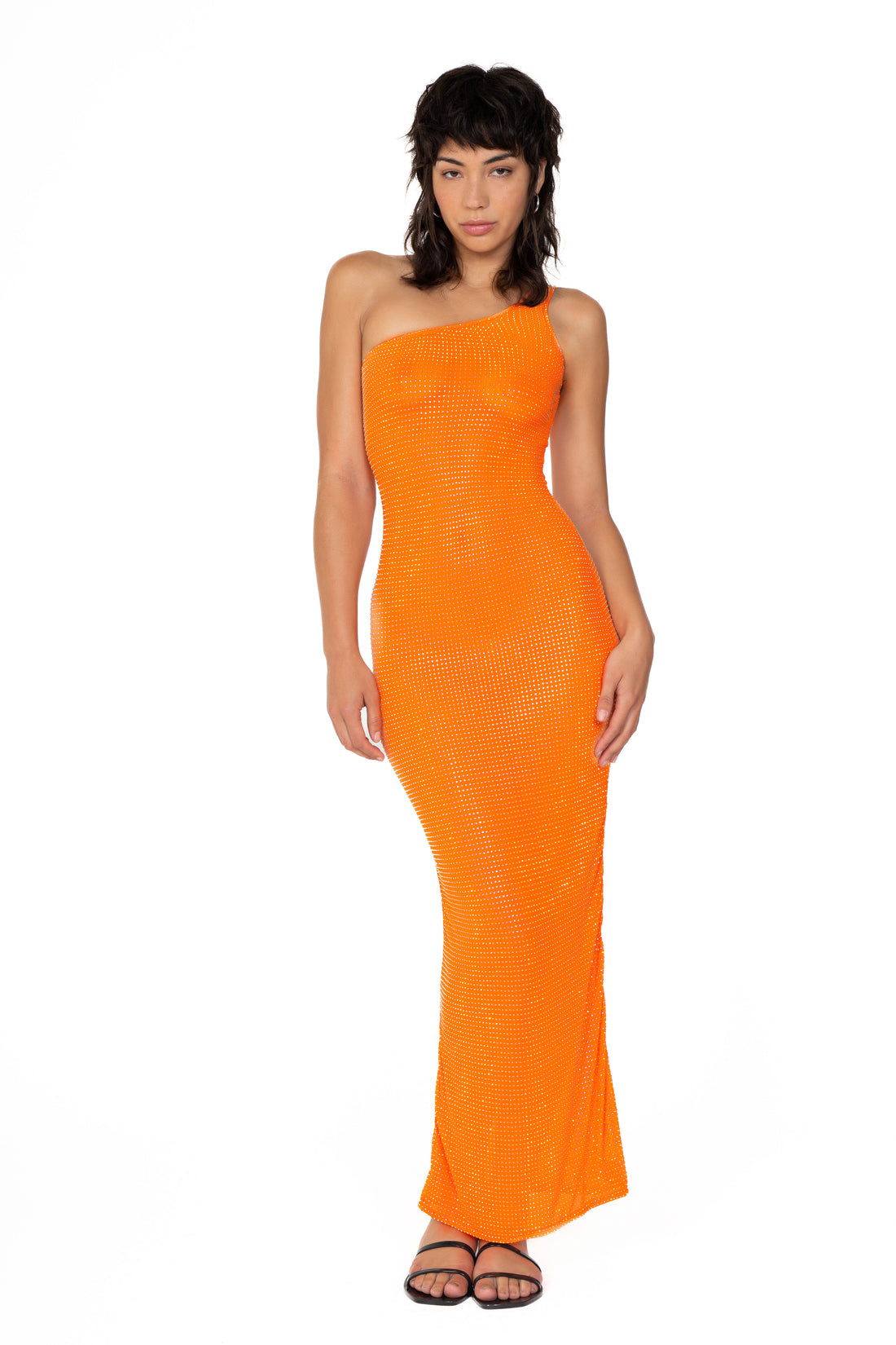 One-shoulder dress with crystal embellishments for a glamorous look.