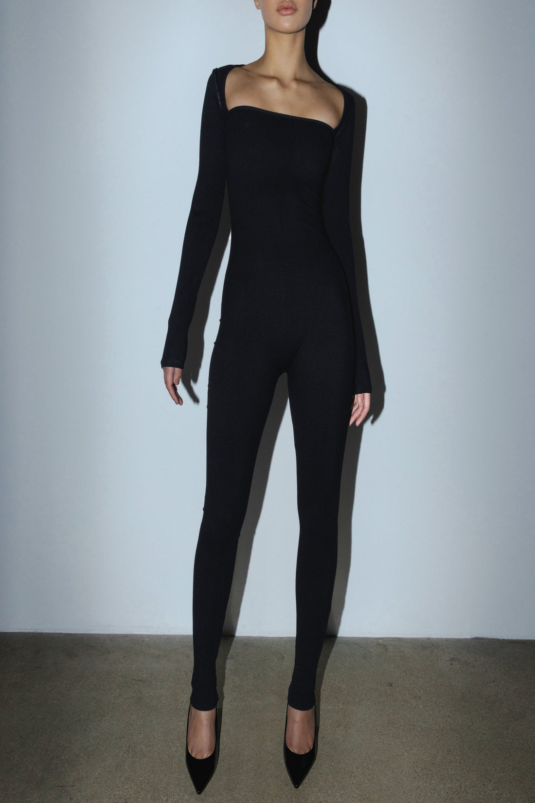 Bodysuit with removable sleeves for versatile styling options